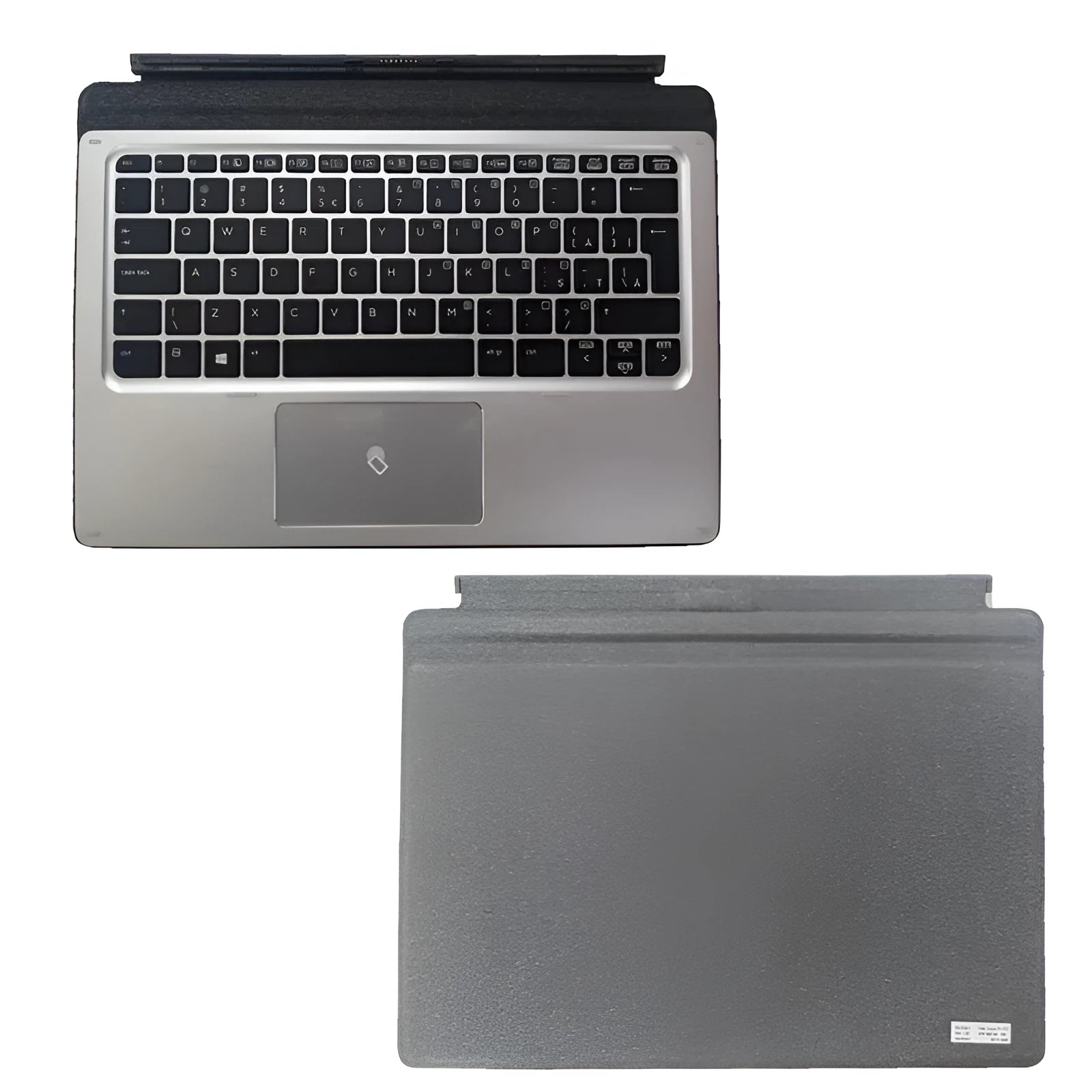 Elite X2 tablet base keyboard with PS/2 cable and multimedia keys on a table next to a thin tablet.