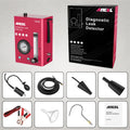 S3000 model car smoke detector and vacuum leak diagnostic tool on a workbench
