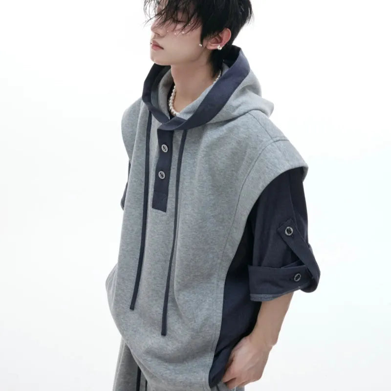 Men's grey hooded sports jacket and matching trousers with three-dimensional stitching detail.
