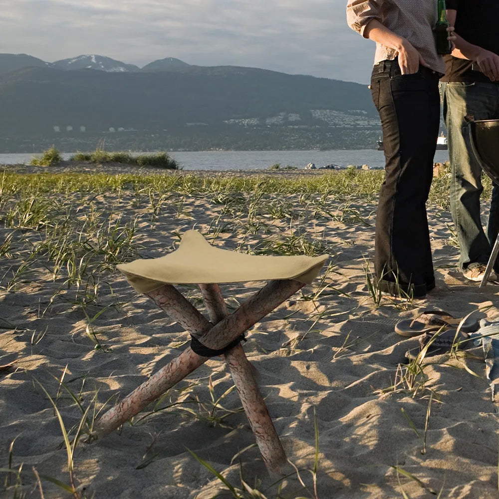 Folding portable camping stool with triangular fabric seat in black, army green, khaki, or brown