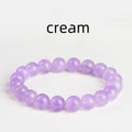 Lavender round amethyst bead bracelet with water ripple texture on a light background.