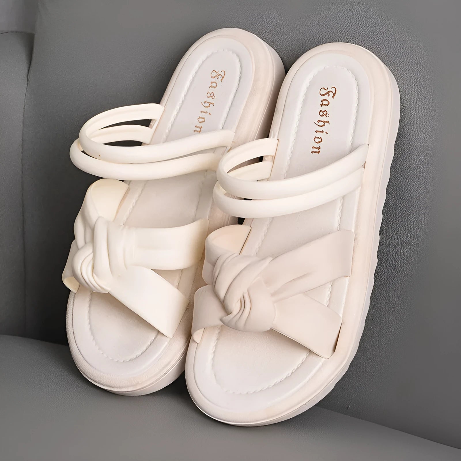 Women's black outdoor sandals with thick soft back and flower detailing on PVC upper