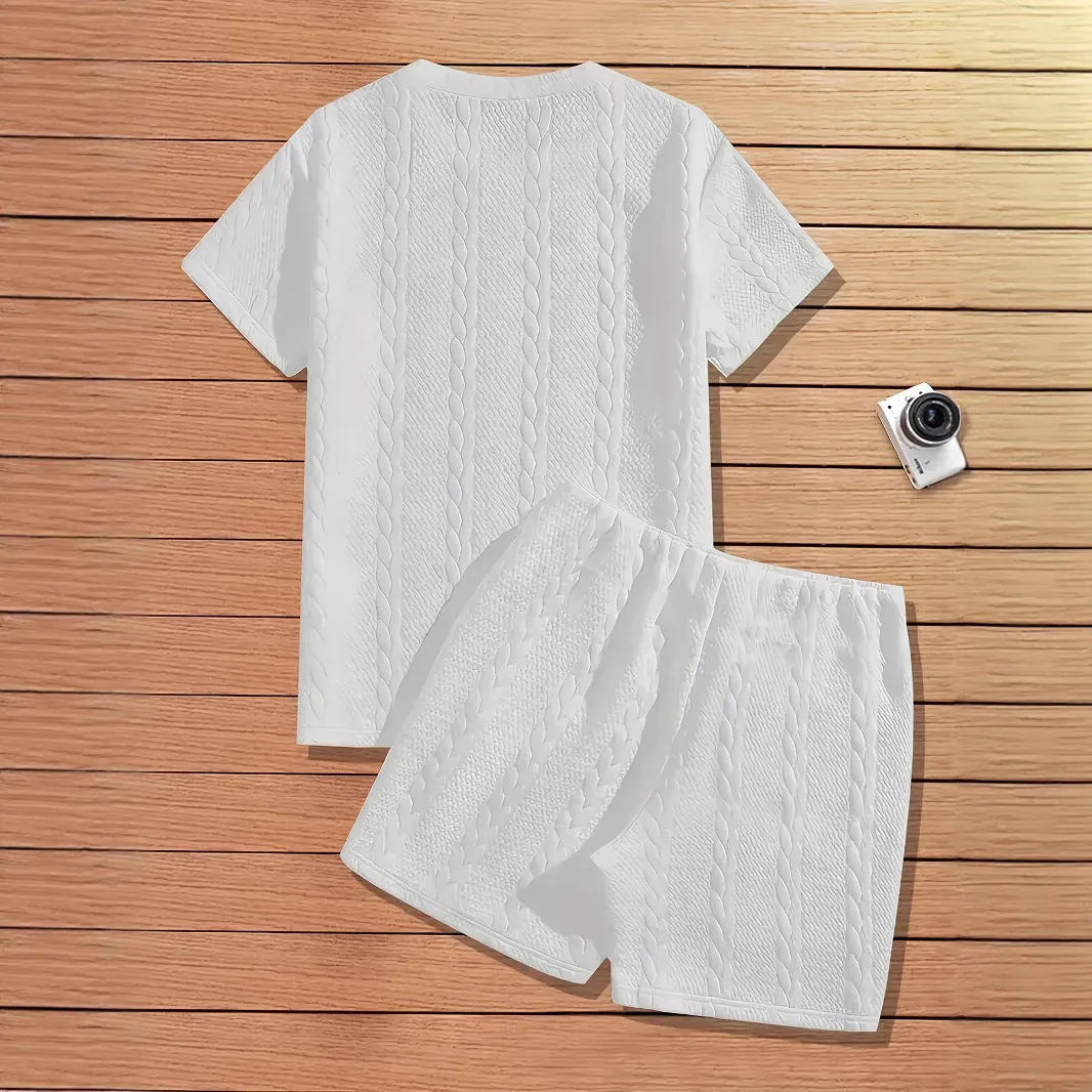 Men's black two-piece sports set with short sleeve T-shirt and matching shorts featuring patch design
