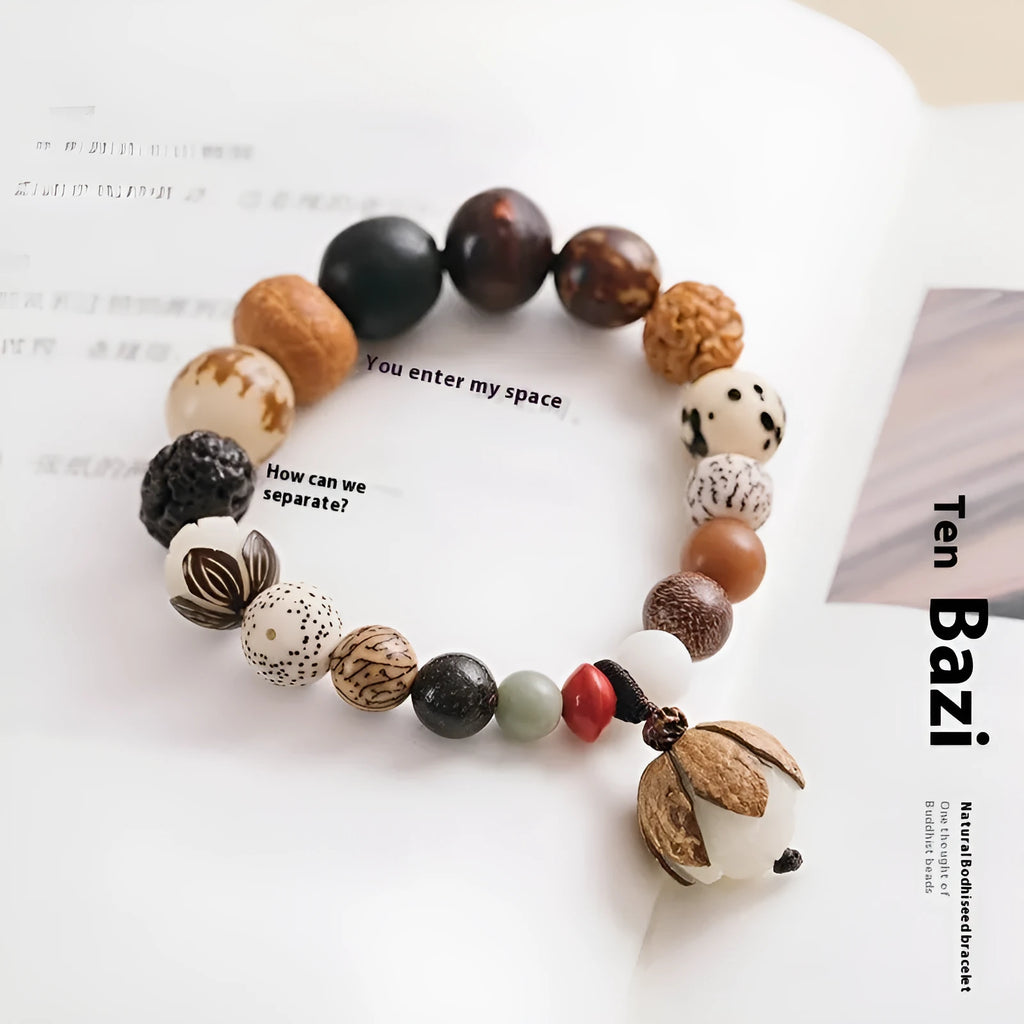 Handcrafted 18-seed Bodhi bead bracelet with geometric design on 16cm wrist