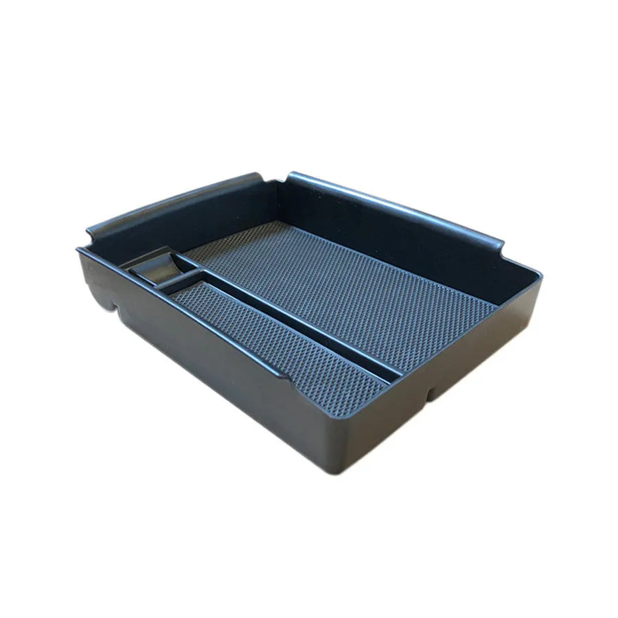 Black wireless charging base stand for Qi smartphones and tablets on a desk