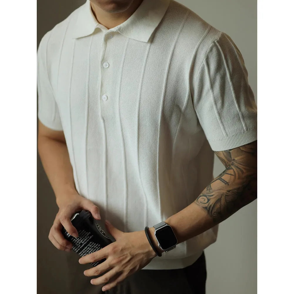 Men's loose fit solid colour t-shirt in black or white, made from polyester fabric.