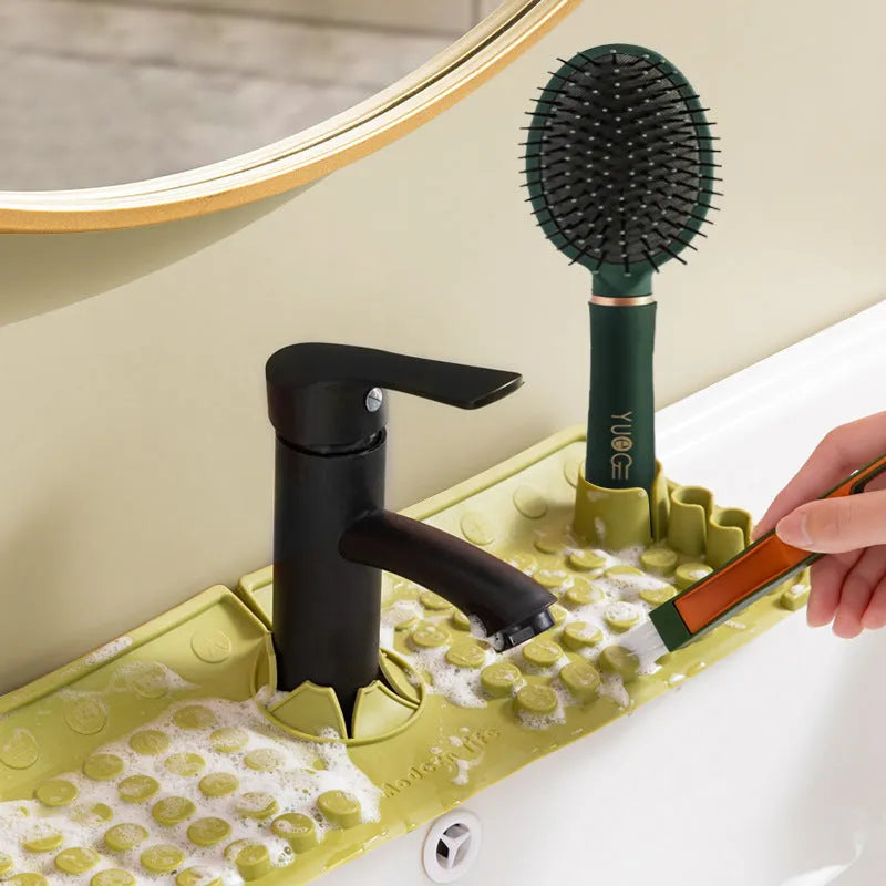 Cream TPR silicone faucet water draining pad measuring 42x14cm on a kitchen countertop