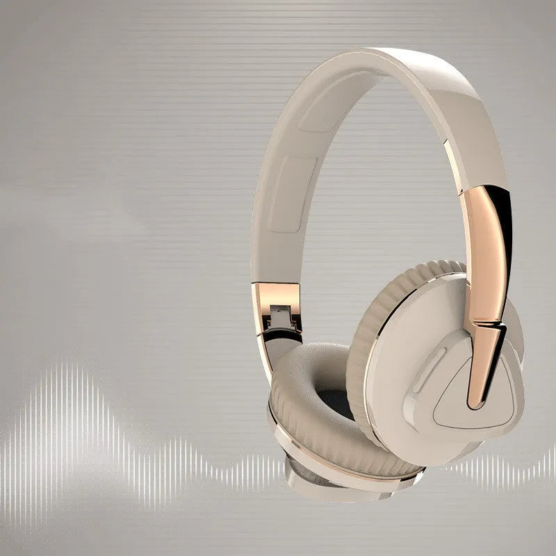 Black wireless over-ear headset with AUX cable and TF card slot, showing soft ear cups and control buttons.