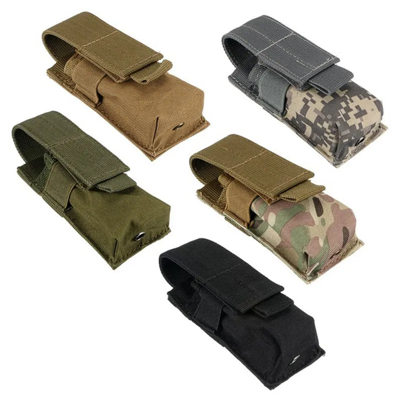 Black MOLLE tactical waist pouch for flashlight and pistol cartridges on a belt