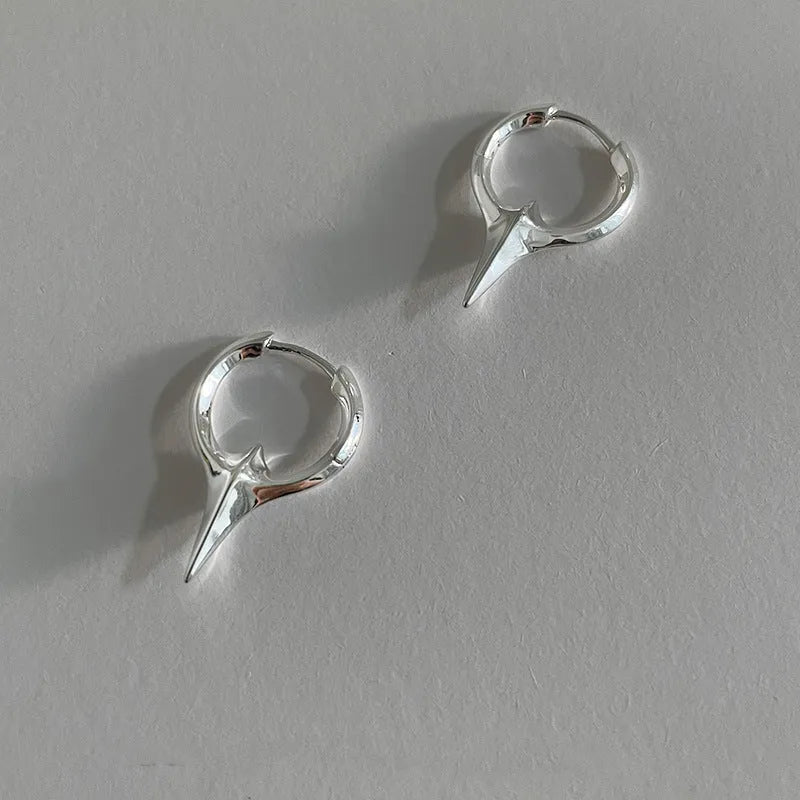 Geometric star-shaped ear clips for women with platinum electroplated finish on copper base