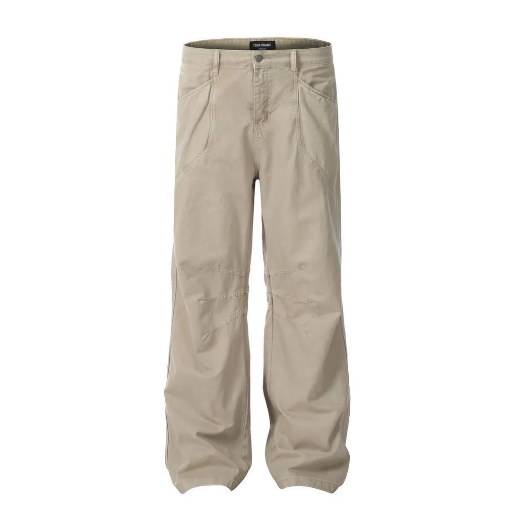 Men's brown loose straight leg jeans with high waist design and zip fly closure