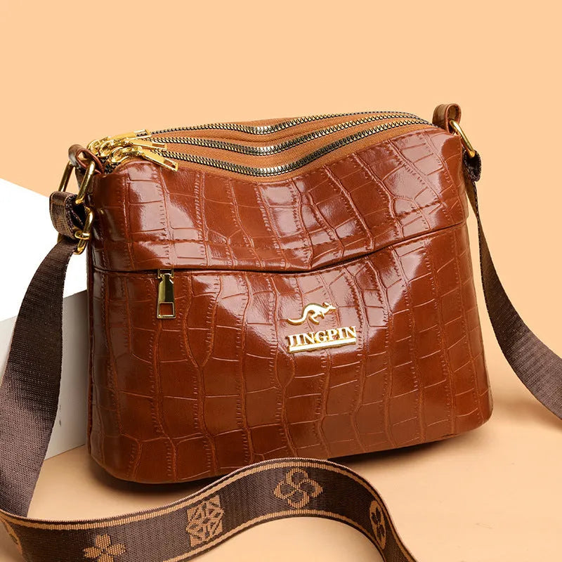 Large capacity cross body messenger bag in PU leather with crocodile pattern finish and multiple compartments