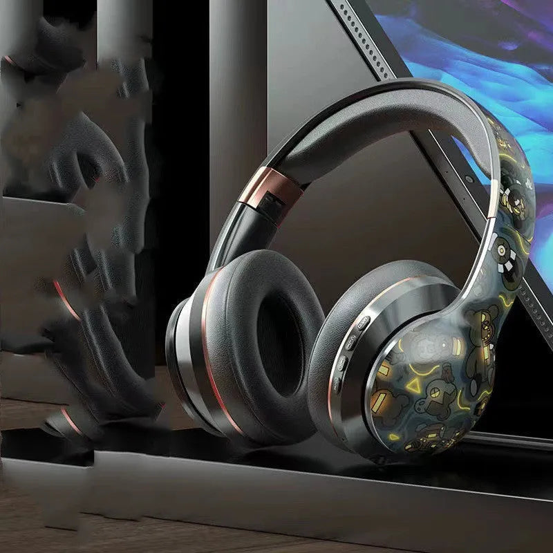 Wireless Bluetooth headphone in head-mounted e-sports style with noise reduction, NFC, and low latency, available in multiple colours