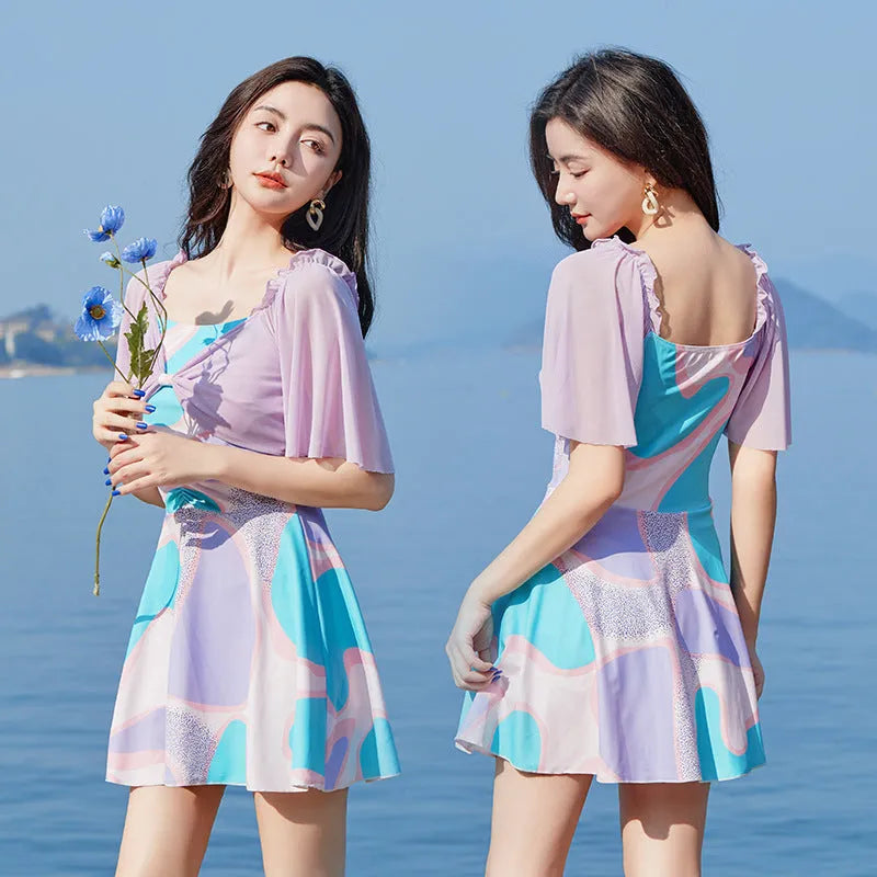 Women's high-waist floral one-piece swimsuit with bowknot detail in light purple or light blue