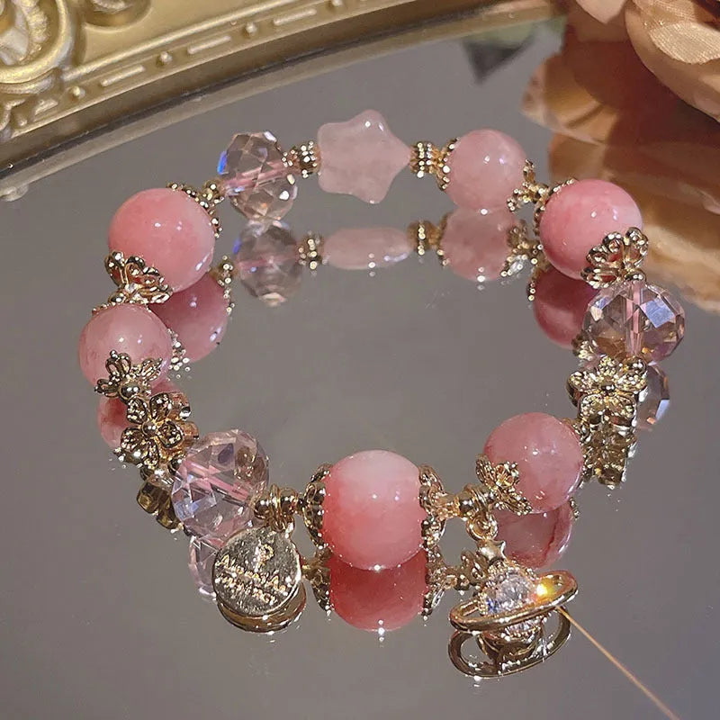 Women's sweet style galaxy colour alloy bracelet with snowflake pendant, heart, bow and cartoon character charms.