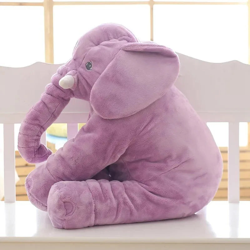 Soft grey elephant plush pillow cover for a child's bed, shown with other colour options.