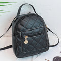 Girls' hard square PU backpack with embroidery in pink, showing front sandwich pocket and carry handle.