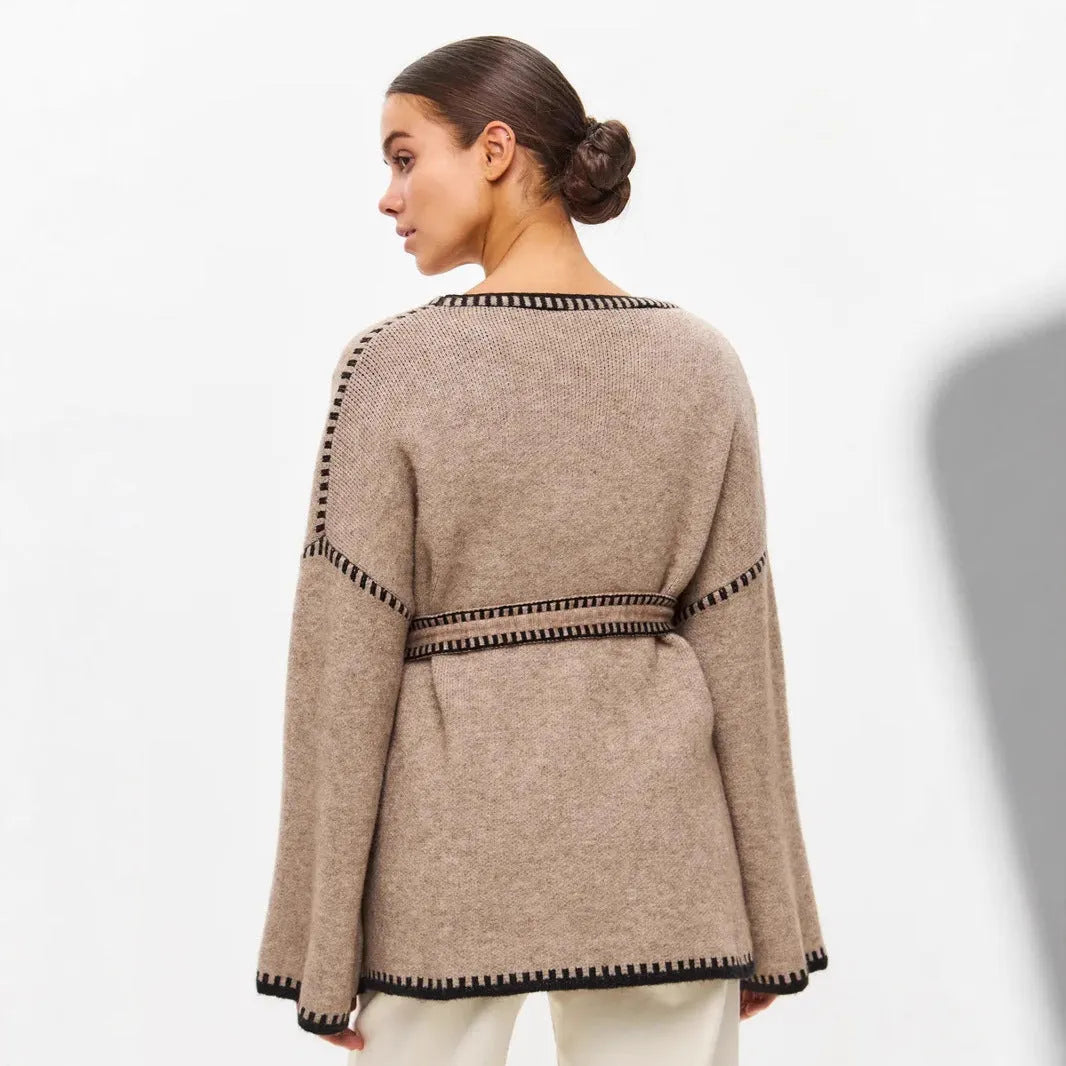 Loose lace-up knitted cardigan sweater coat in camel colour showing front detail