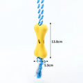 Green cotton rope bone-shaped dog chew toy with knot details and treat cavity