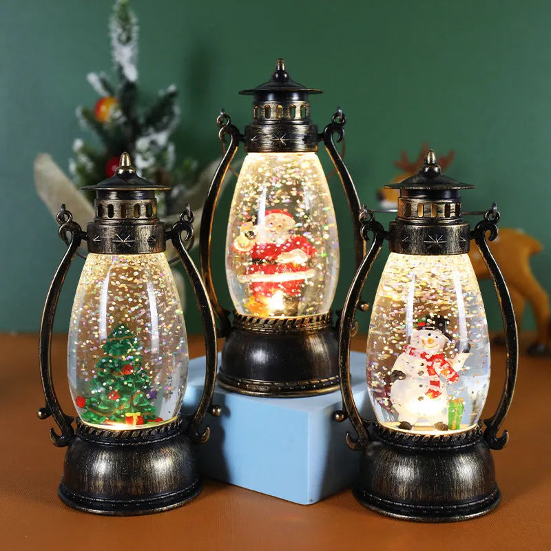 Portable crystal ball oil lamp Christmas decoration on a desktop, showing snowman and elderly figure options.