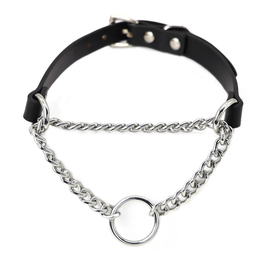 Black leather dog collar with chain tightening mechanism and matching leash on dark background
