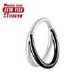 Titanium alloy nose ring body jewellery in silver colour on a plain background.