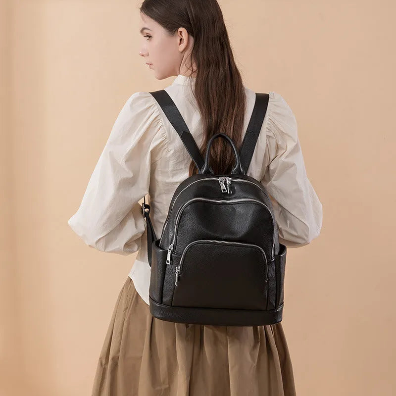 Soft PU leather women's large capacity backpack in black, tan or coffee purple with anti-theft zip and slit pocket