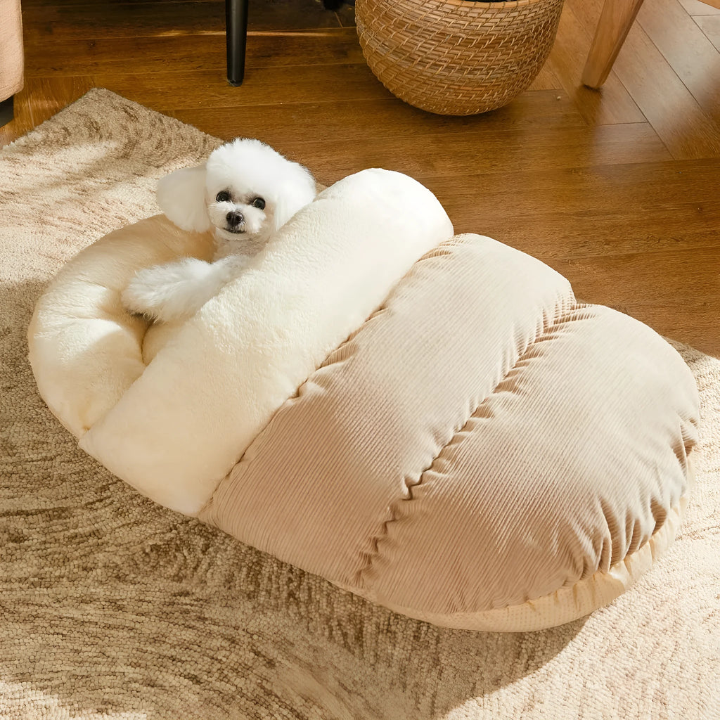 Grey corduroy slipper-shaped cat cave bed with plush interior, shown both as a closed hideout and opened as a flat lounging bed.