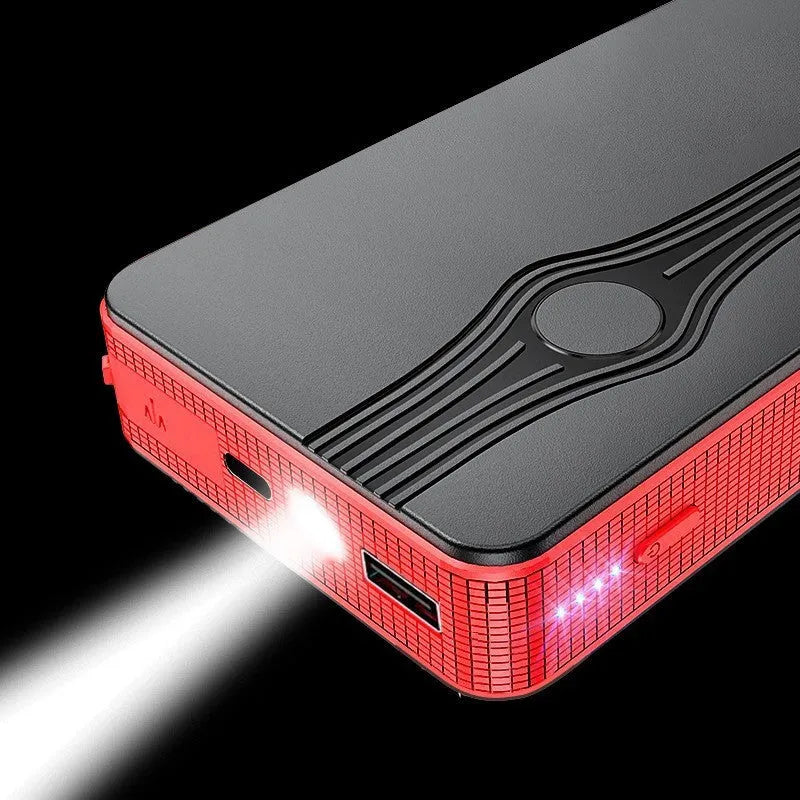 Red K4-E automobile emergency jump starter power supply with data cable.