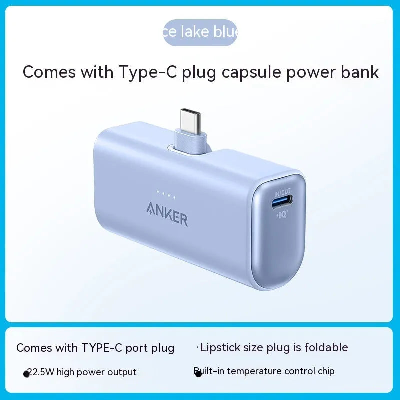 Compact capsule-shaped power bank in multiple colours with a fold-out USB-C cable.