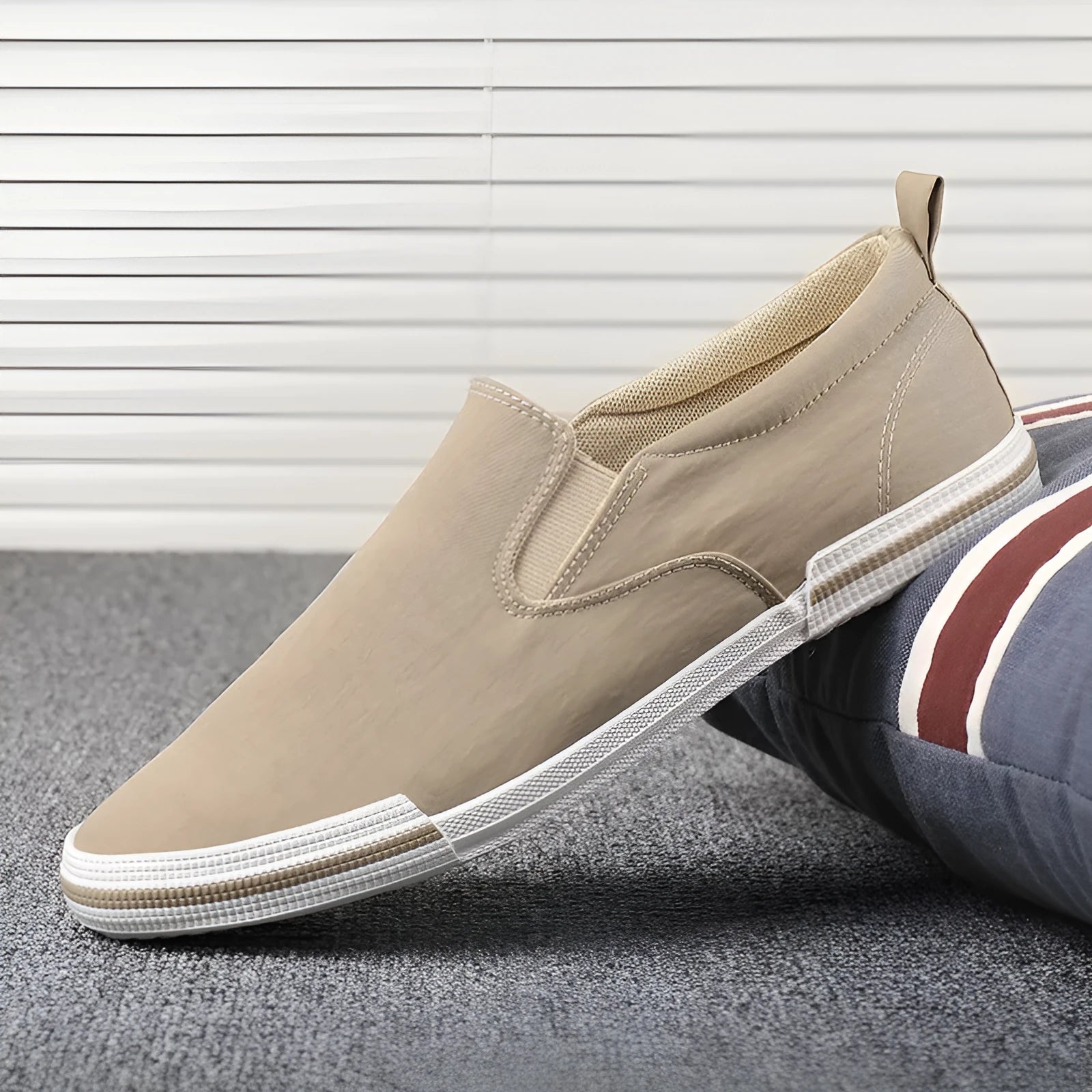 Men's low-top canvas sneakers in grey, black orange, and khaki colours with round toe and vulcanised rubber soles