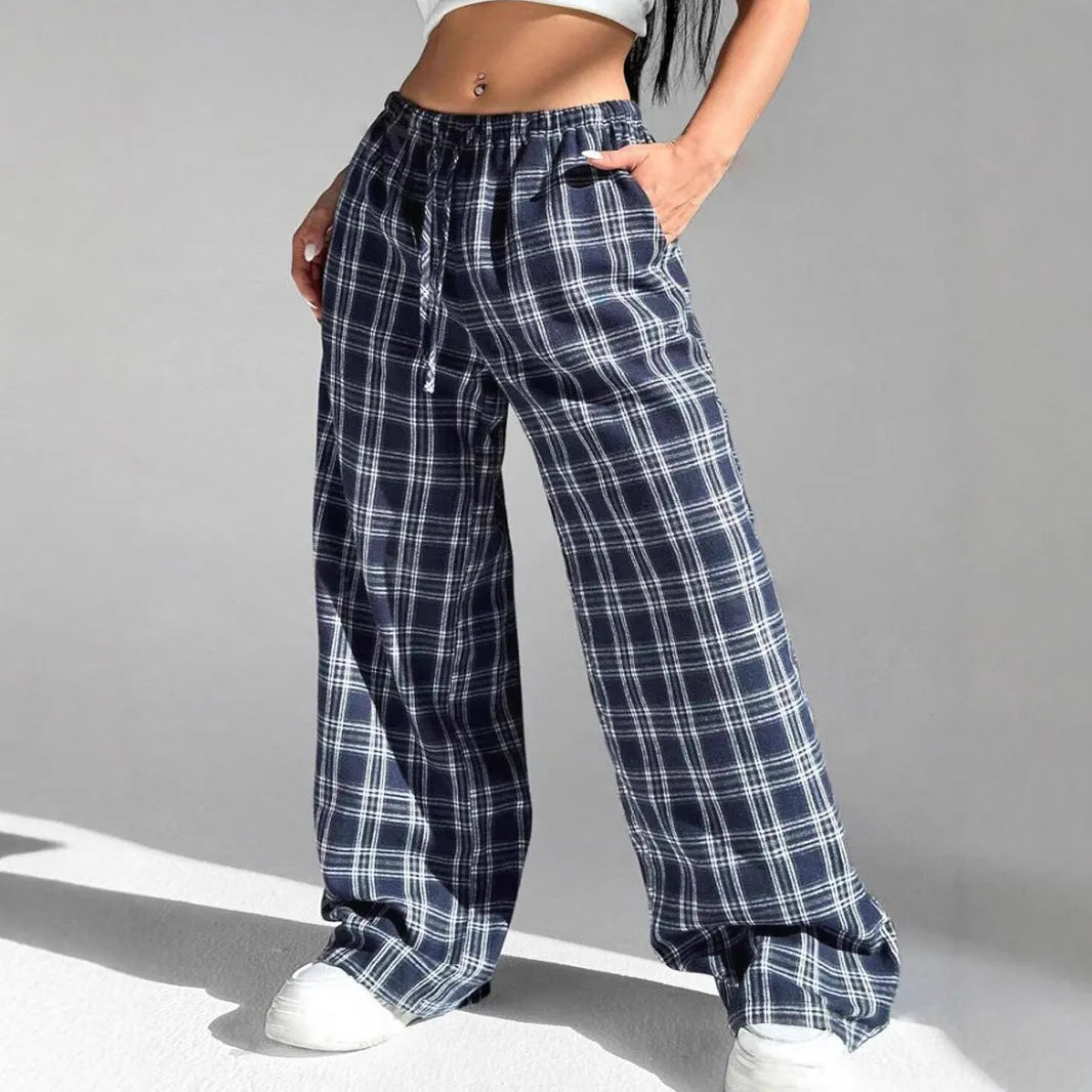 Women's plaid trousers with drawstring waist and multiple pockets in blue or red colours