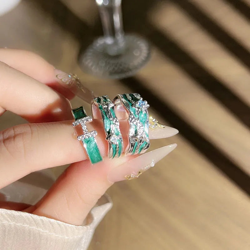 Mint green enamel astrology star ring with asymmetrical folded design on copper base