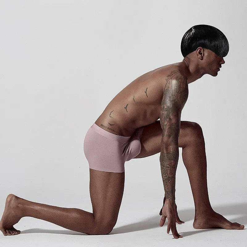 Men's seamless modal underwear in white, pink, green colours showing mid waist fit