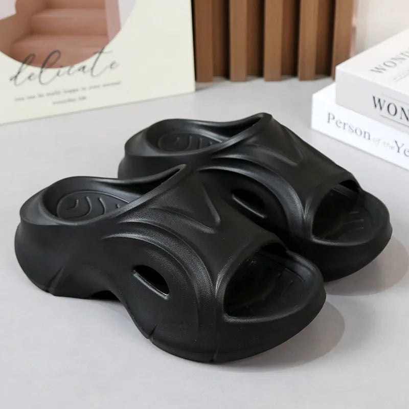 Women's thick-soled EVA beach slippers in rose red colour with round toe design.
