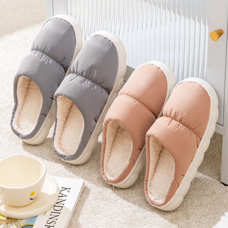 Blue down cotton slippers with artificial leather uppers, thick rubber soles, and plush lining for indoor winter wear.