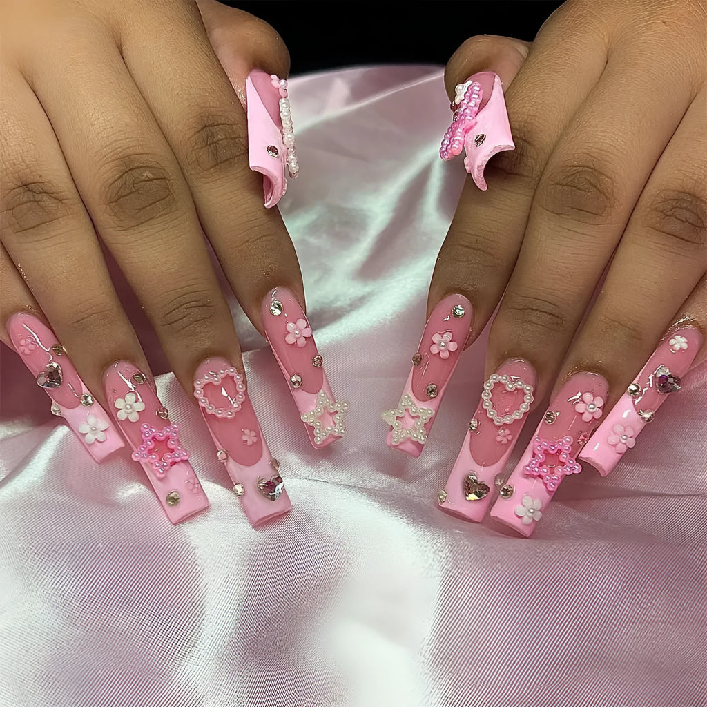Super long French style artificial press-on nails with a decorative bow and spot drill accents in colour XB-70-48.