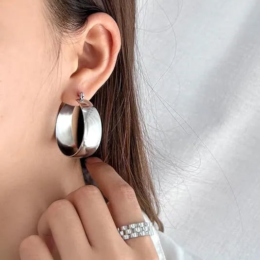 Stainless steel widened curved earrings in gold or steel colour, 25mm or 30mm sizes