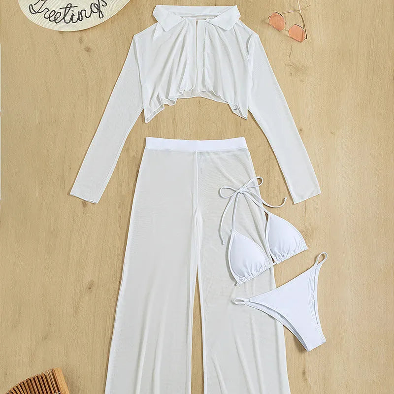 White women's four-piece swimsuit set showing top, high-waist trousers, bra, and panties arranged flat