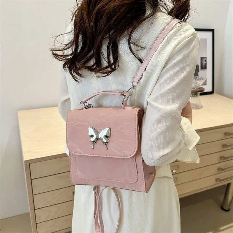 Women's preppy style PU backpack handbag with bow detail in choice of six colours