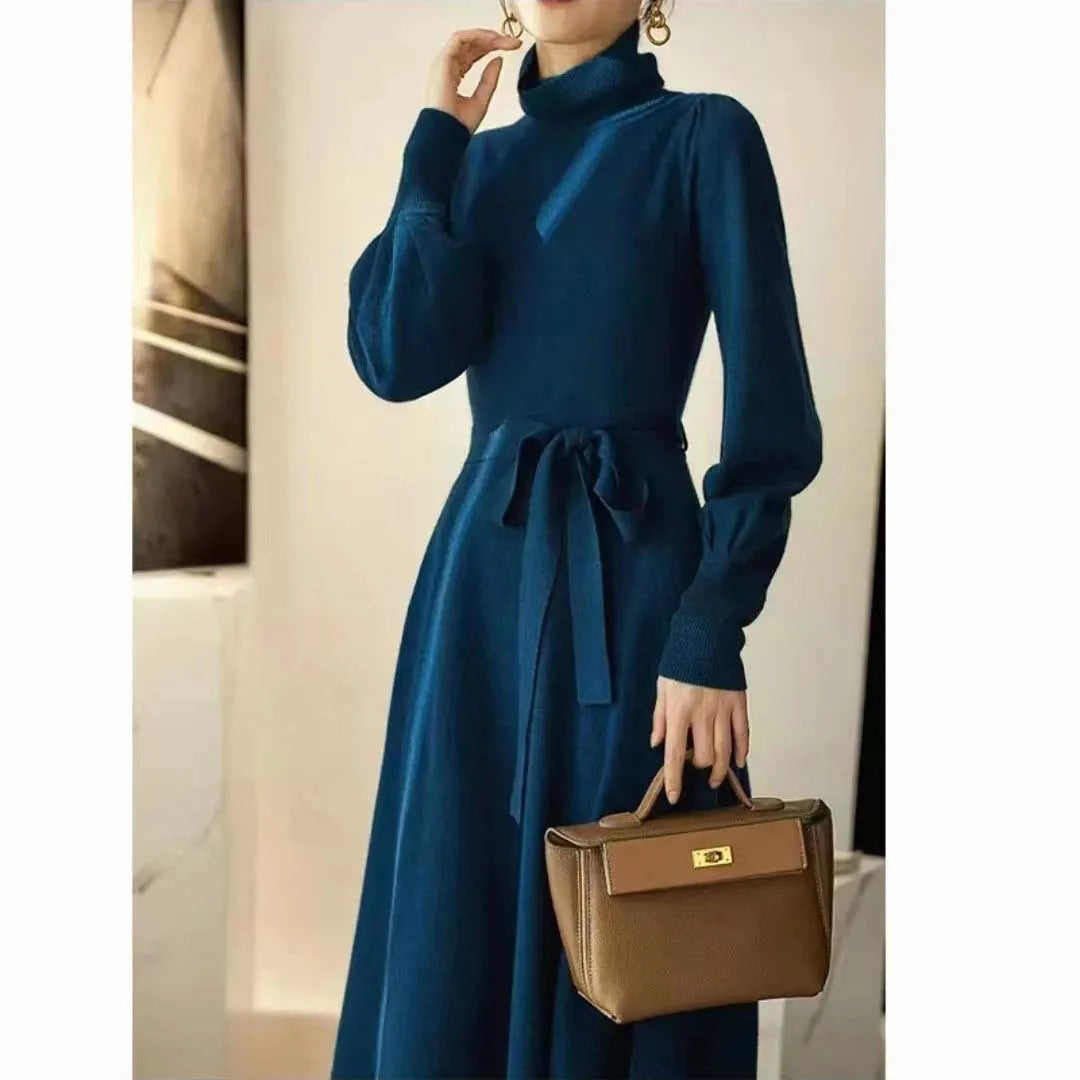 Ladies solid colour knit midi dress with turtleneck and elastic waist in rose red.