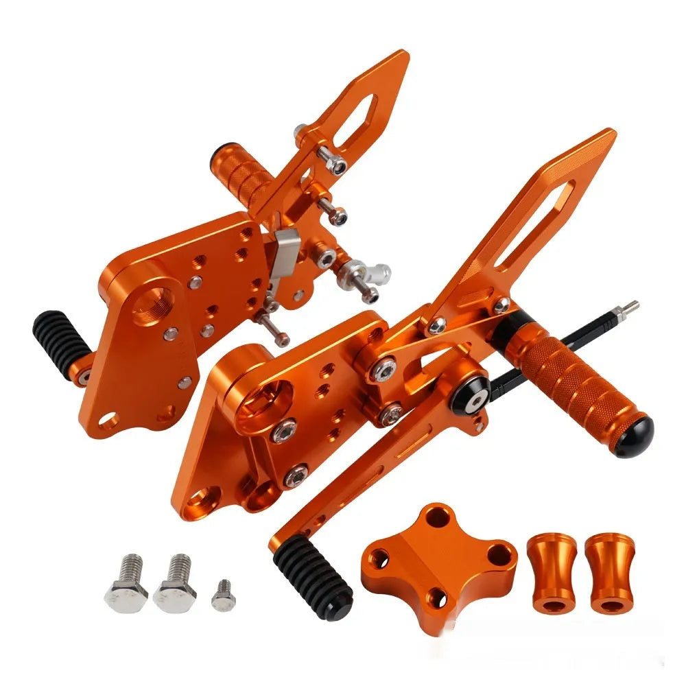 KTM Duke motorcycle pedal support assembly in black and orange for 125 200 250 390 models