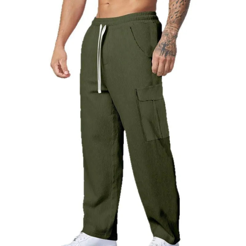 Men's corduroy cargo trousers in loose-fitting wide-leg style with drawstring waist