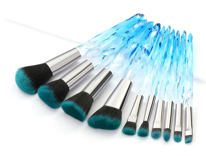 Set of ten clear crystal-handled foundation brushes with synthetic bristles in a choice of colours.