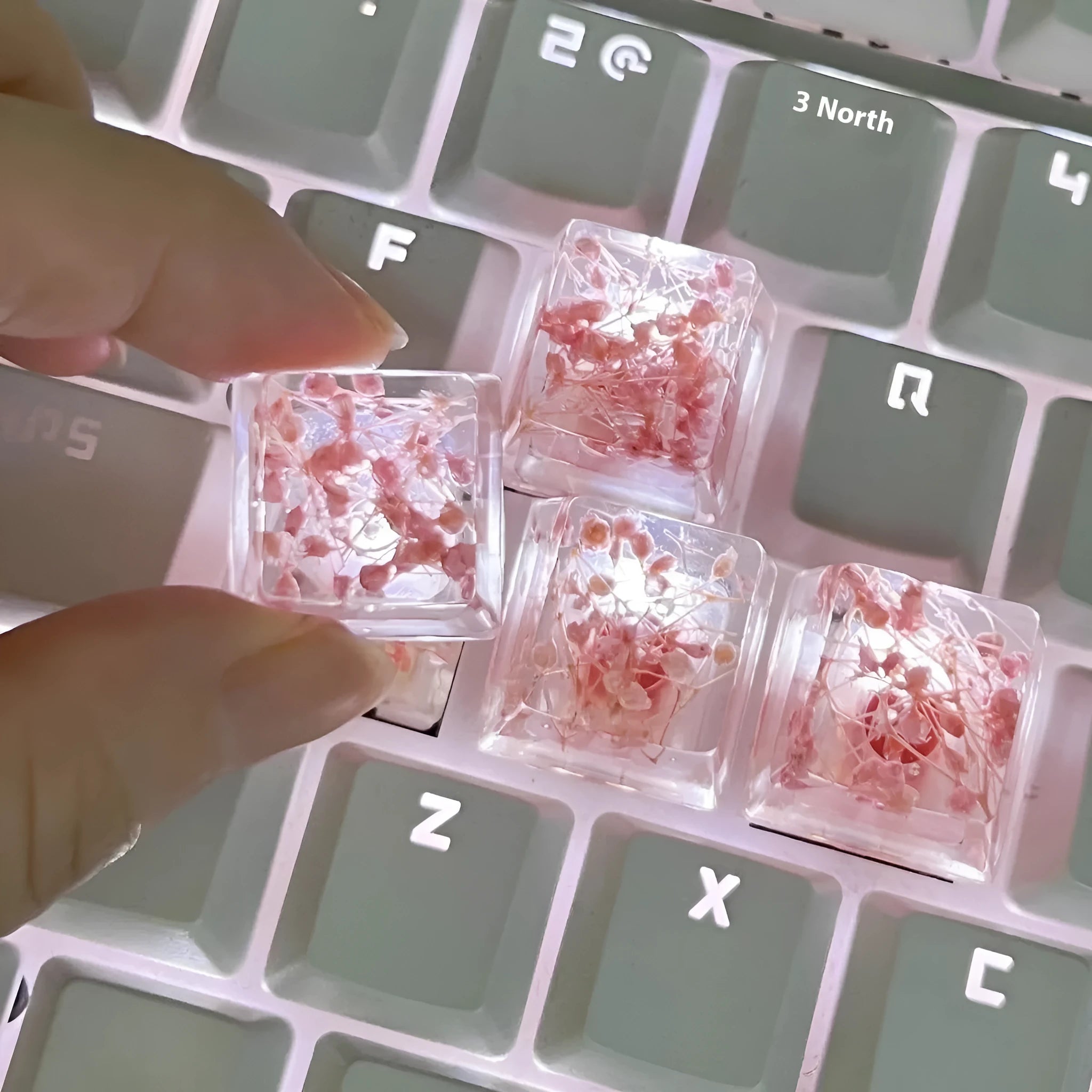 Transparent resin keycap with starry sky pattern in four colour options for mechanical keyboards
