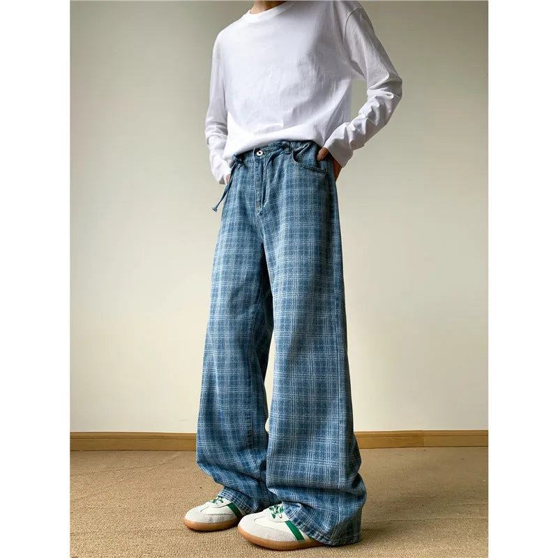 Retro blue plaid wide-leg skinny jeans showing straight-leg cut and zip fly
