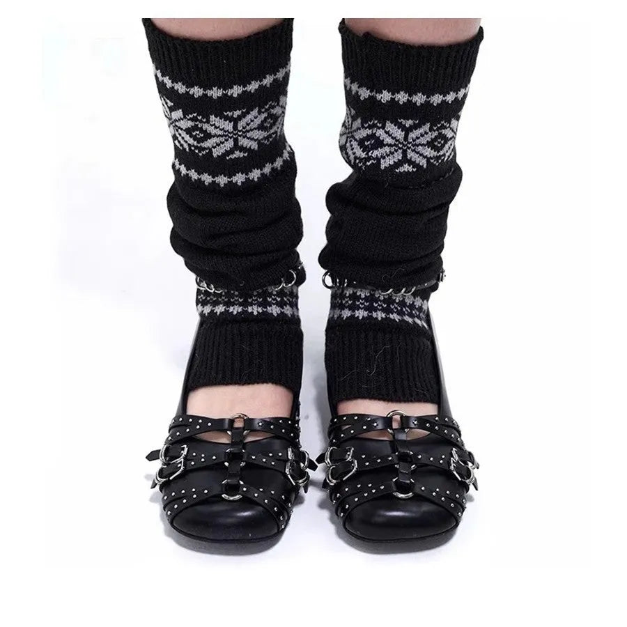 Women's black patent leather retro pumps with a square toe and buckle fastening on a low flat heel.