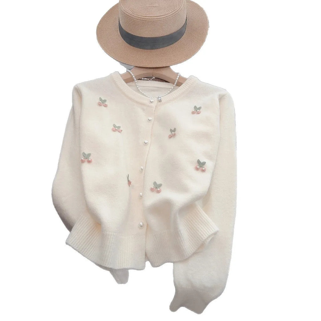Women's beaded cashmere cardigan in slim fit free size showing round neck and decorative detail