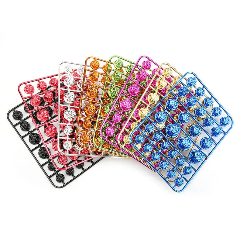 Set of 30 coloured ABS plastic screw caps for motorcycle bolt threads in eight colours.