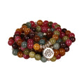 Tourmaline-colour alloy bracelet with 108 beads in a lotus string design laid flat
